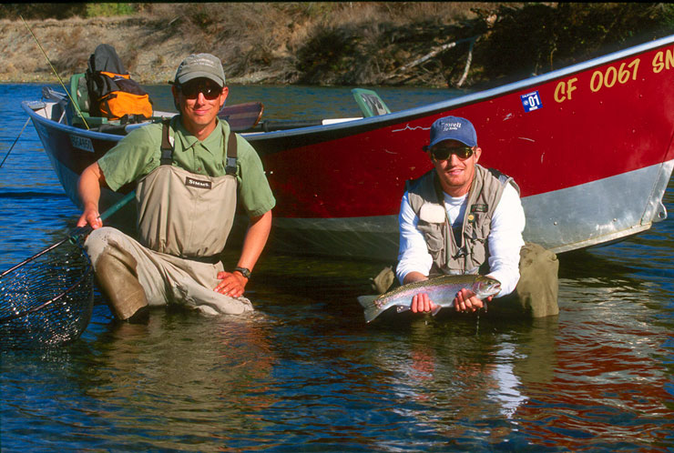 Guide Andrew Harris and guest with a Feather River steelhead