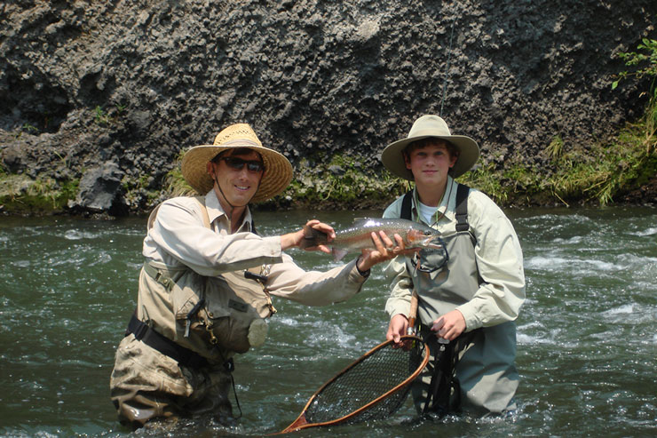Guide Andrew Harris and guest with a nice Pit River rainbow