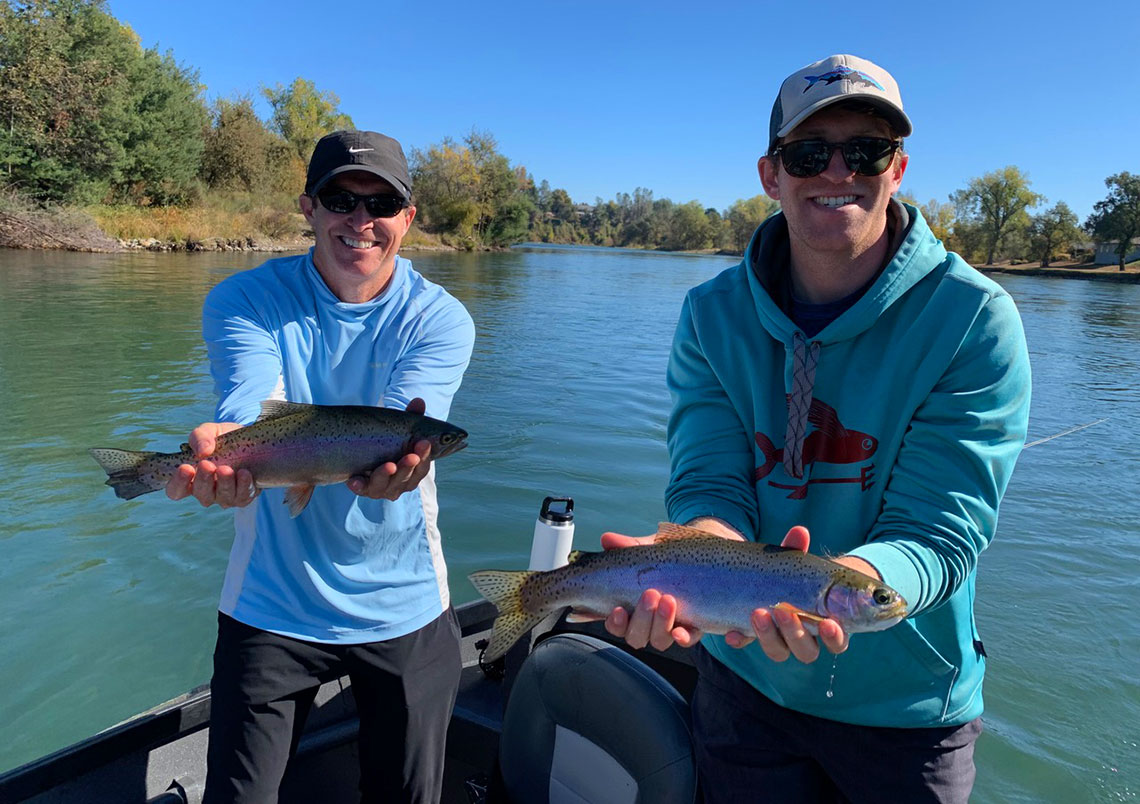 Two Confluence Outfitters guests with two great fish from the Lower Sac