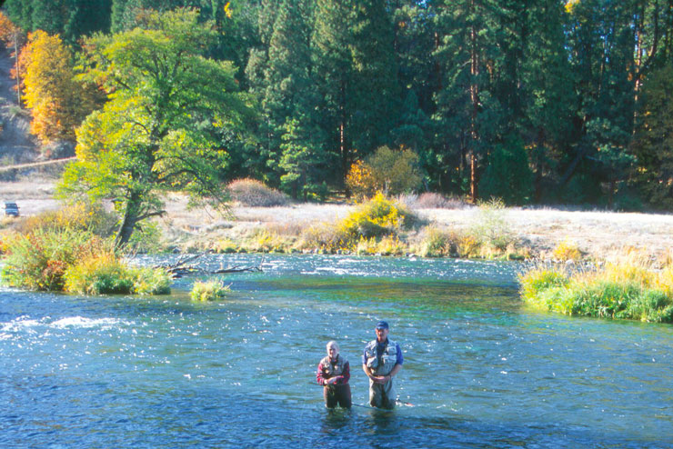 A guide and angler fishing the Powerhouse Riffle on Hat Creek