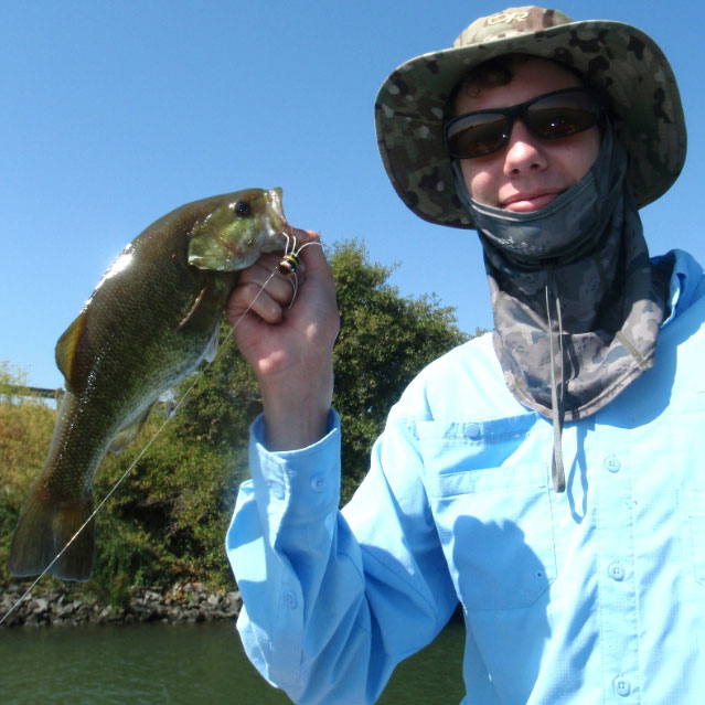 A smallmouth bass fooled by a surface popper on the California Delta