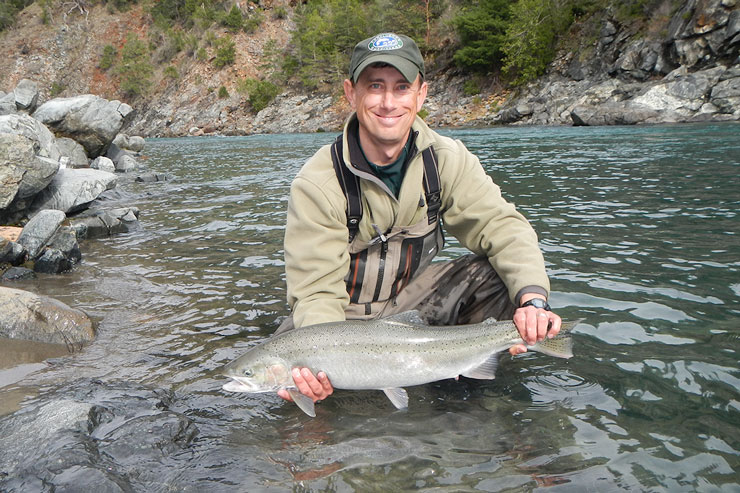 Guide Andrew Harris with a nice Smith River steelhead.